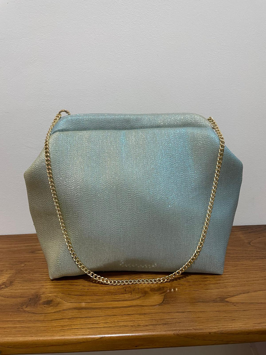 Borsa Starling in tessuto dorato cangiante con chiusura clic-clac